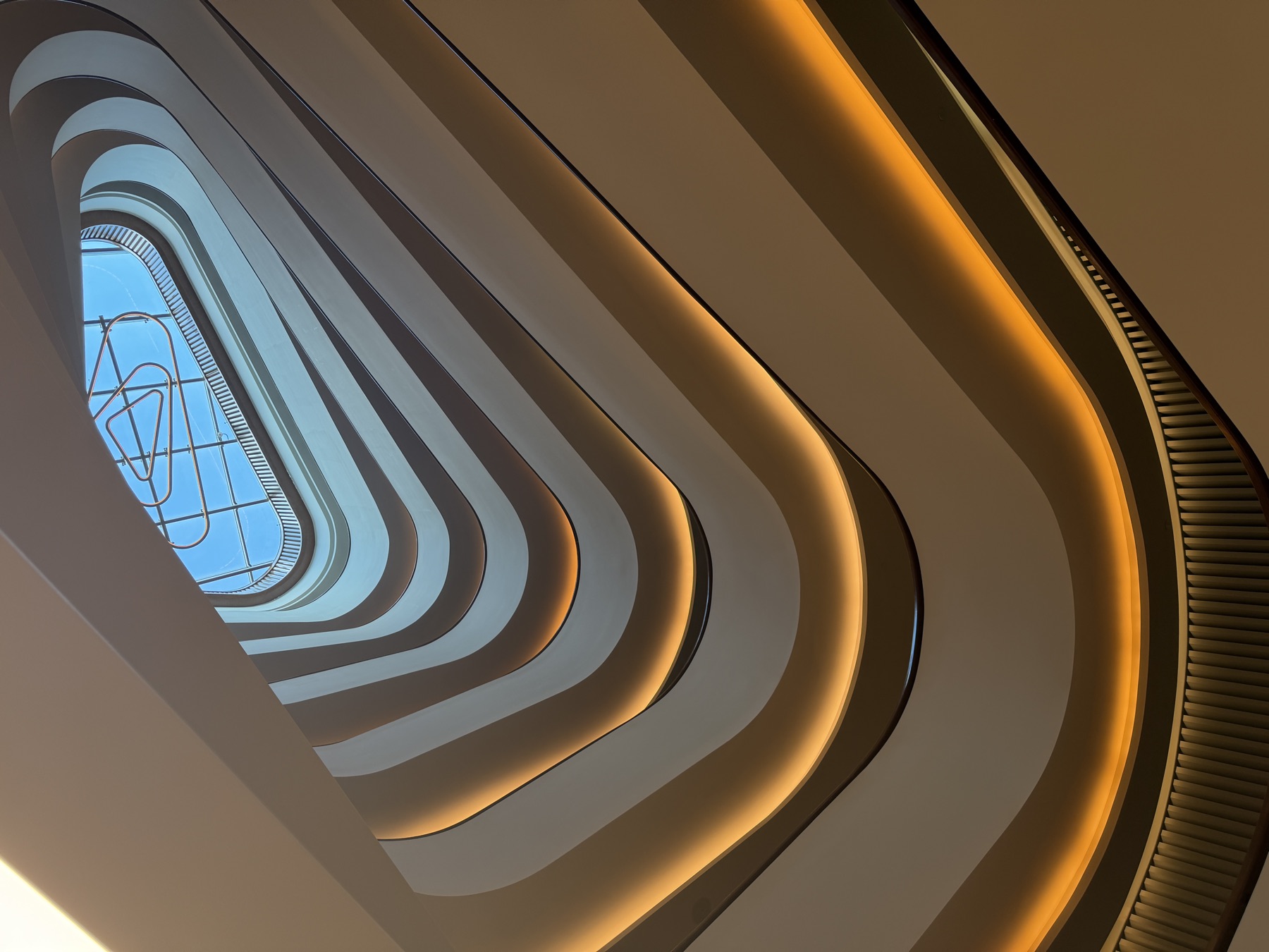 The curved atrium of the Conrad Orlando at Evermore