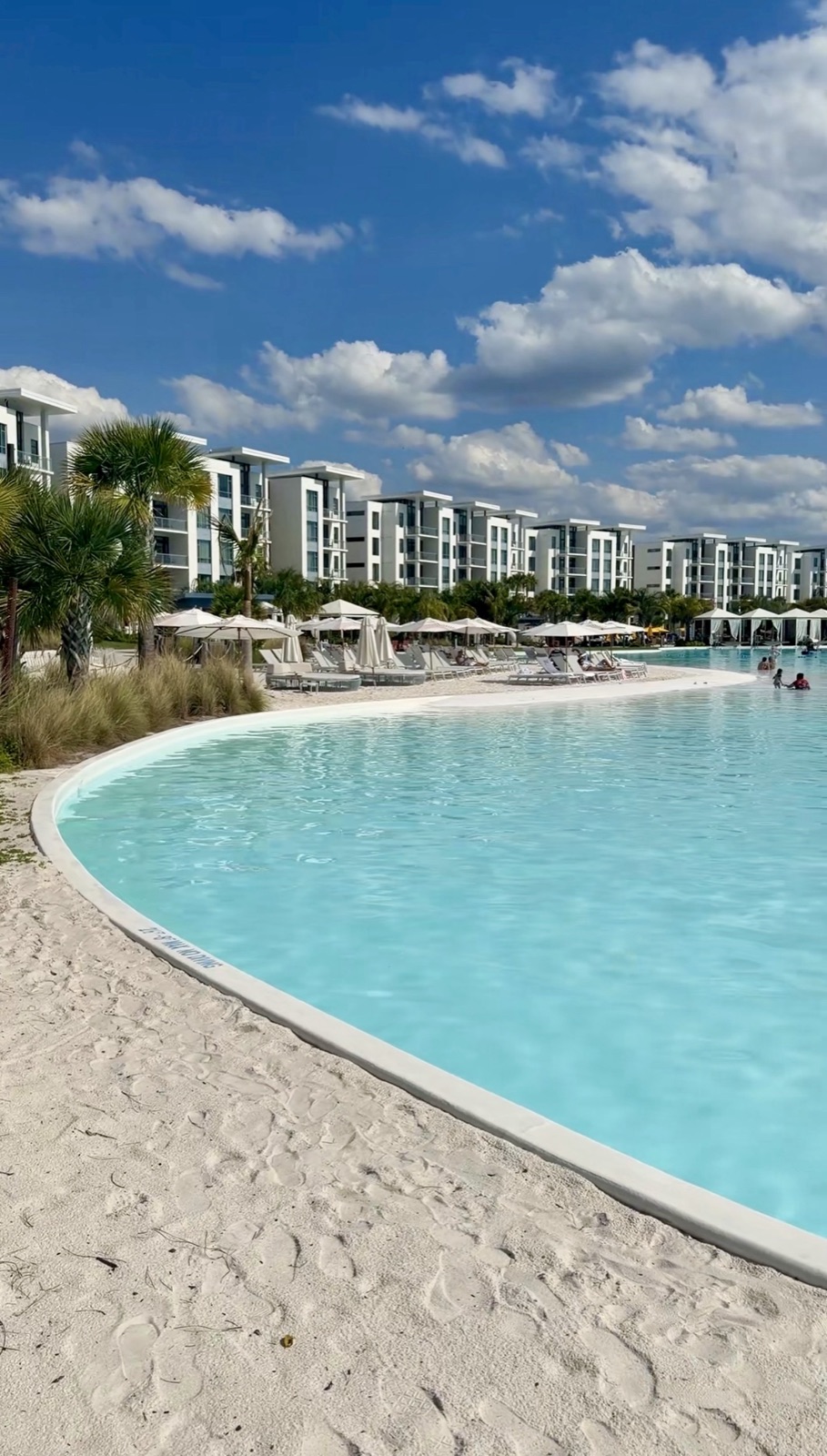 The lagoon and white residences at Evermore Orlando