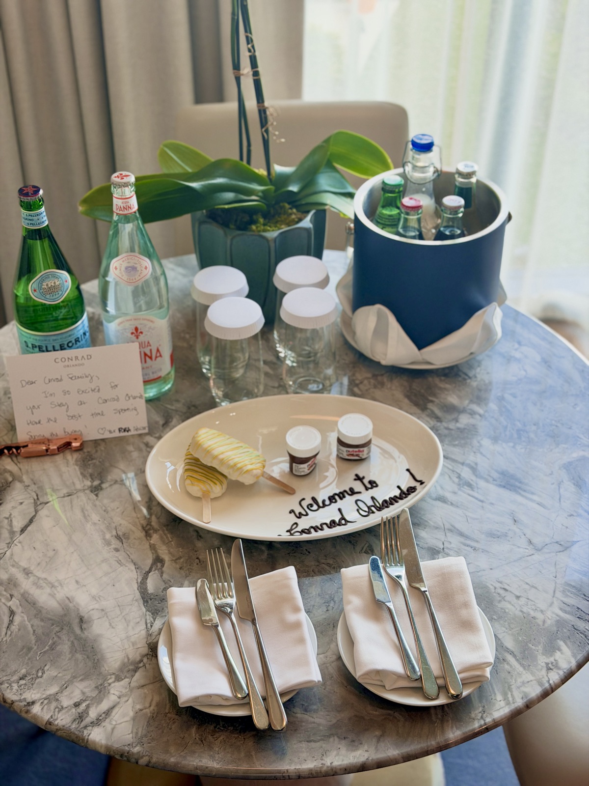 A welcome amenity set out in a guest room at the Conrad Orlando