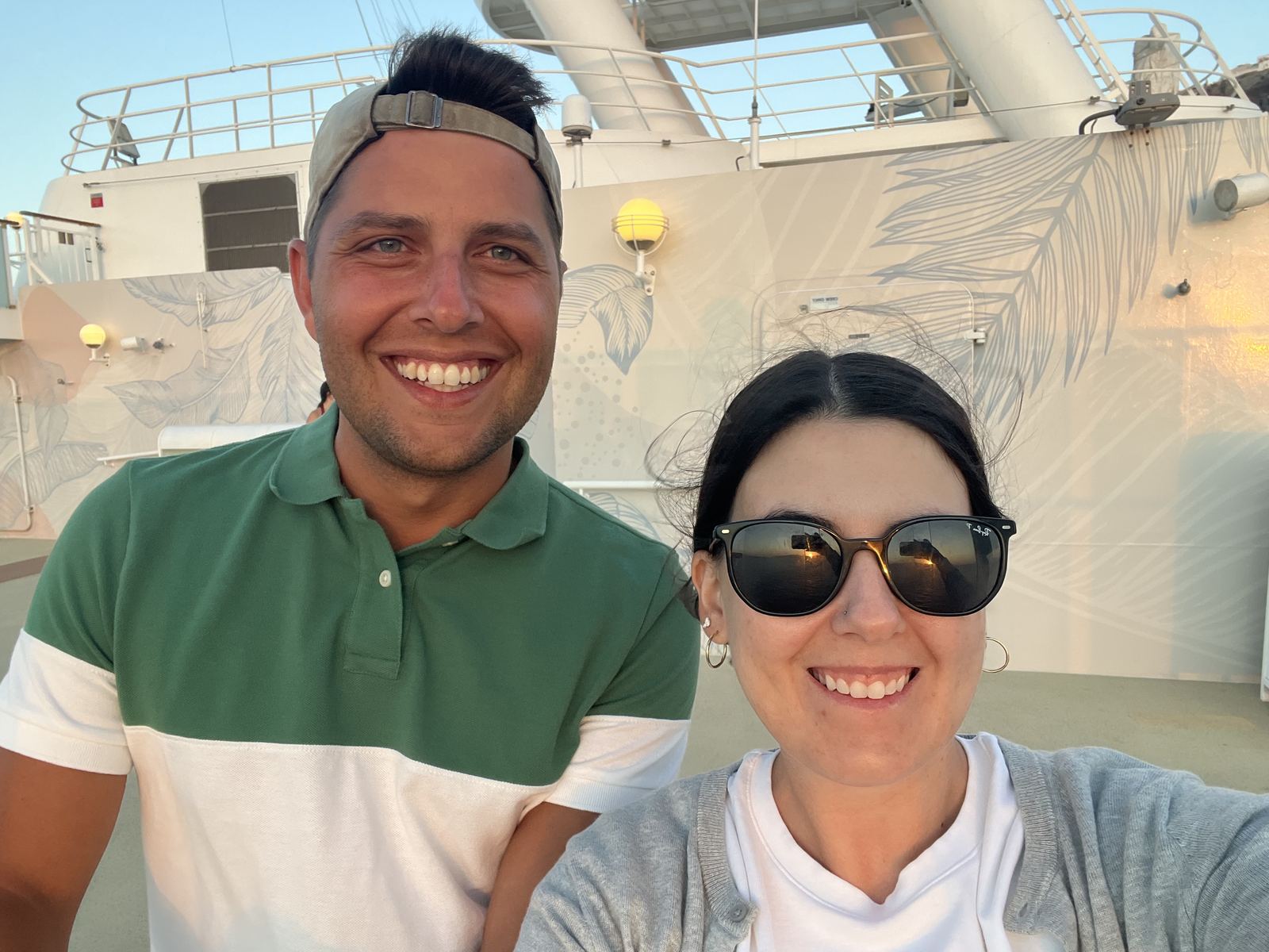 Zachary C. and Kate N. on deck at sunset during their Mediterranean cruise