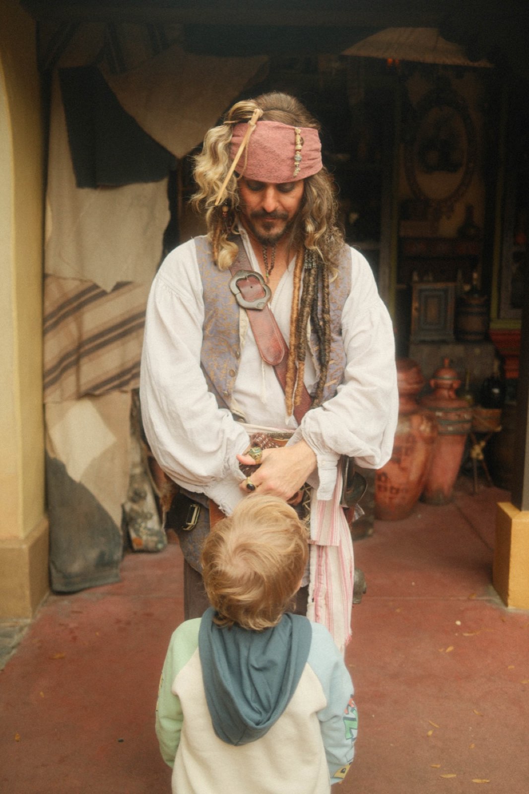 A child meeting Captain Jack Sparrow at Walt Disney World Resort