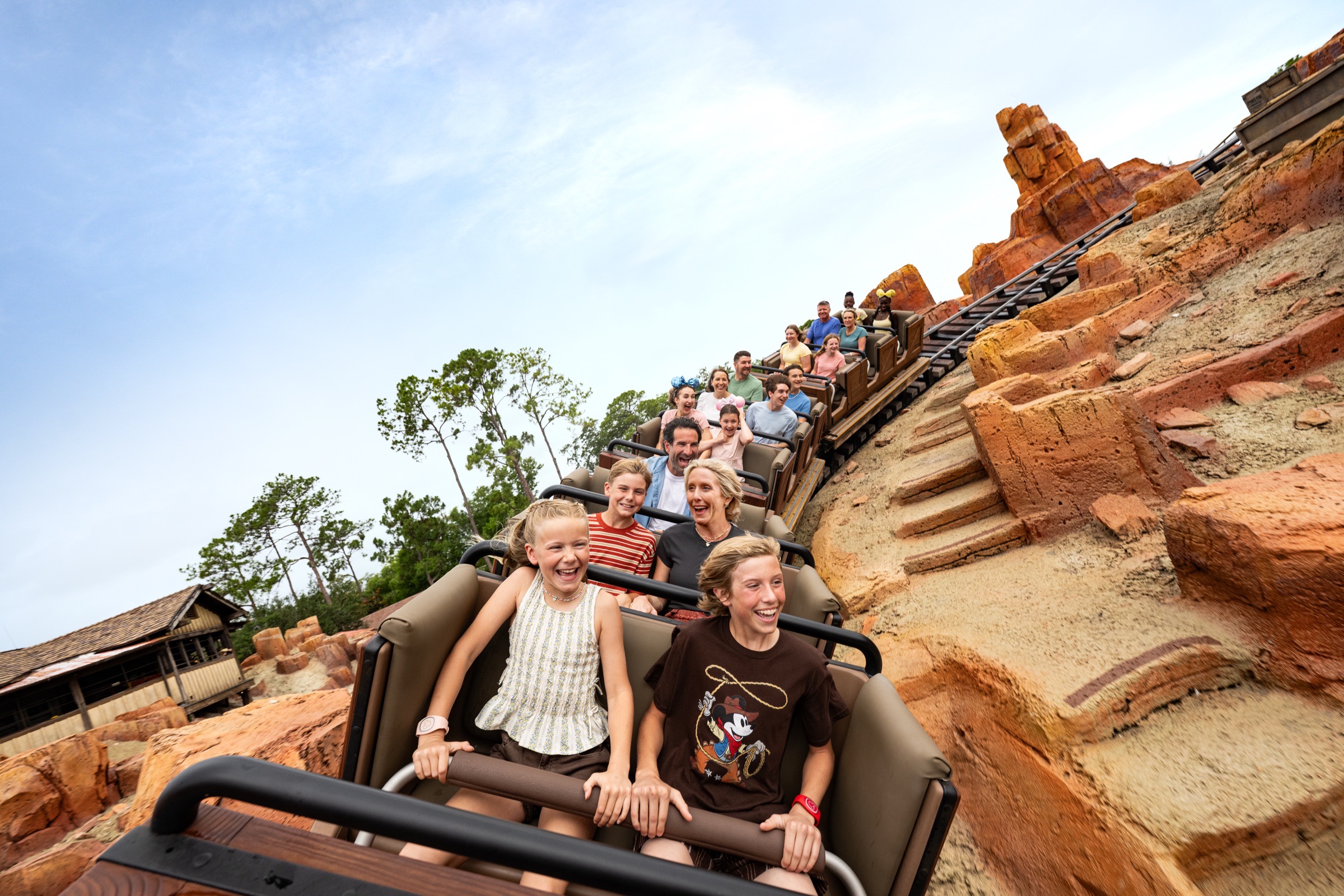 Riders laughing near the top of the lift hill on Big Thunder Mountain Railroad
