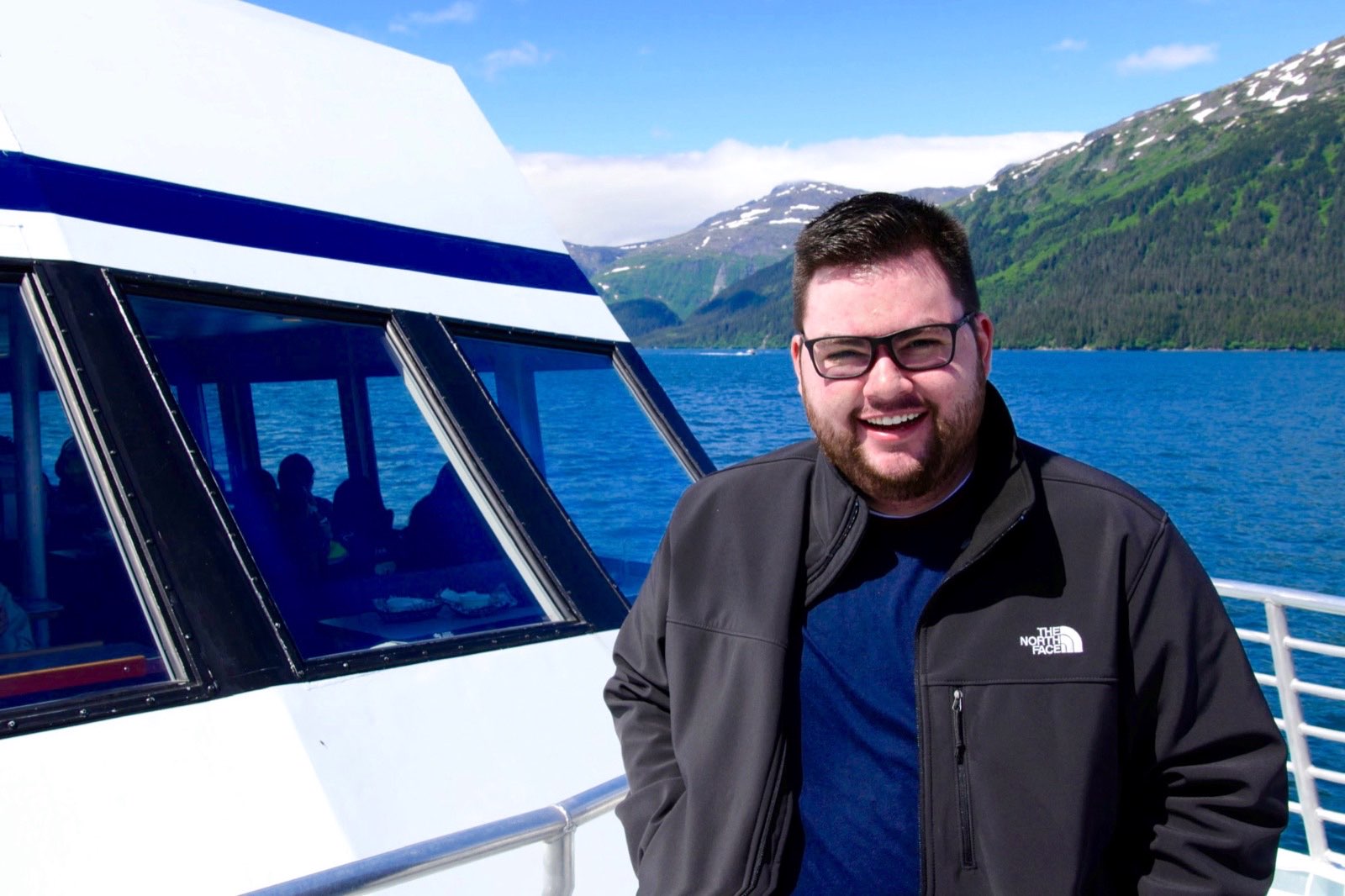 Rob on a boat in Alaska