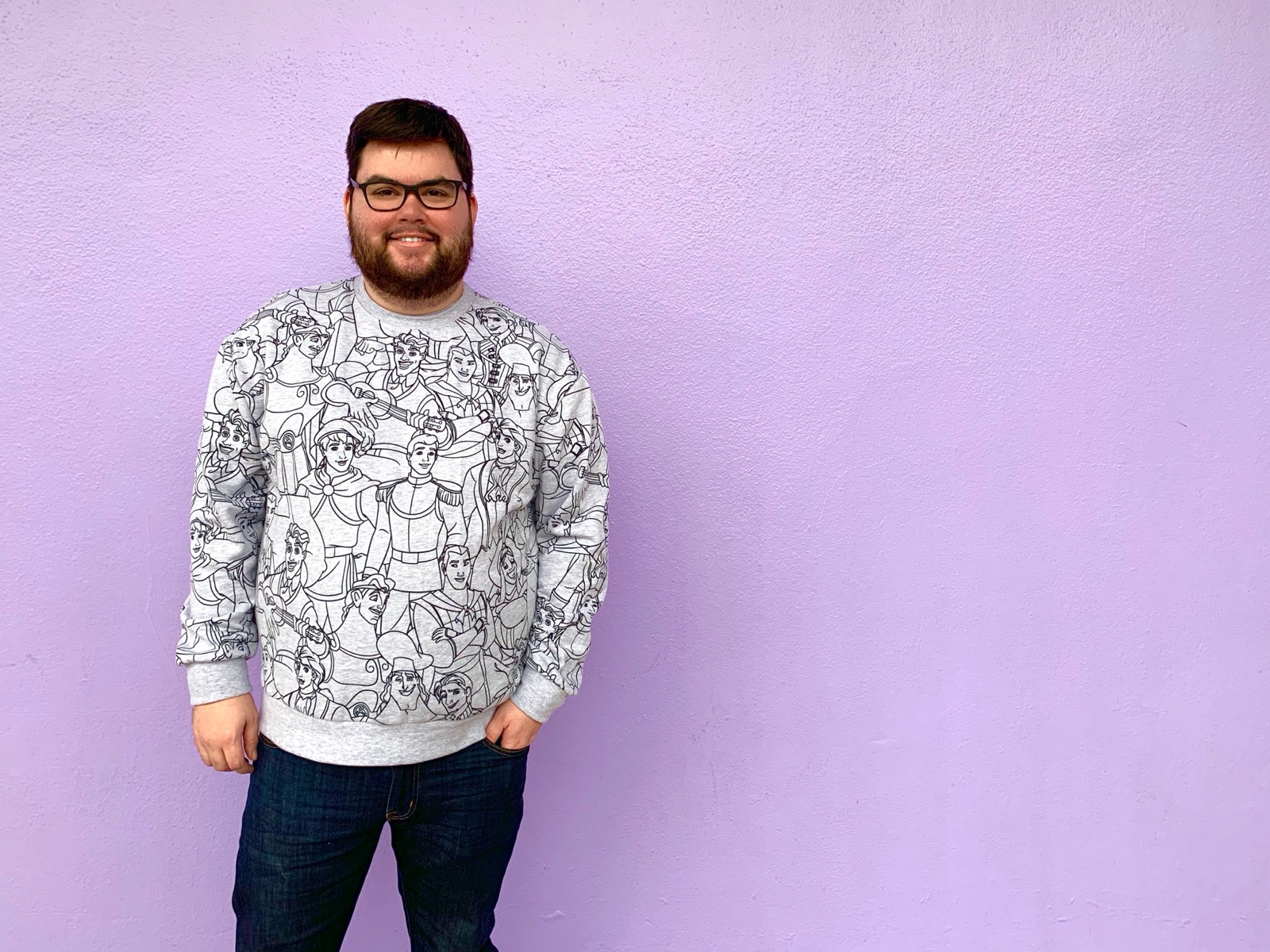 Rob Cole smiling in front of the purple wall at Magic Kingdom Park